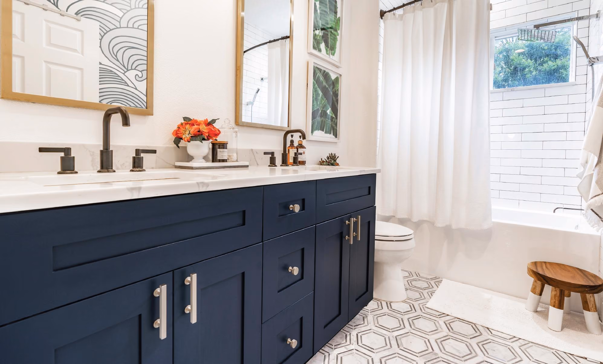 Imperial Blue bath vanity: navy cabinets, white marble counters