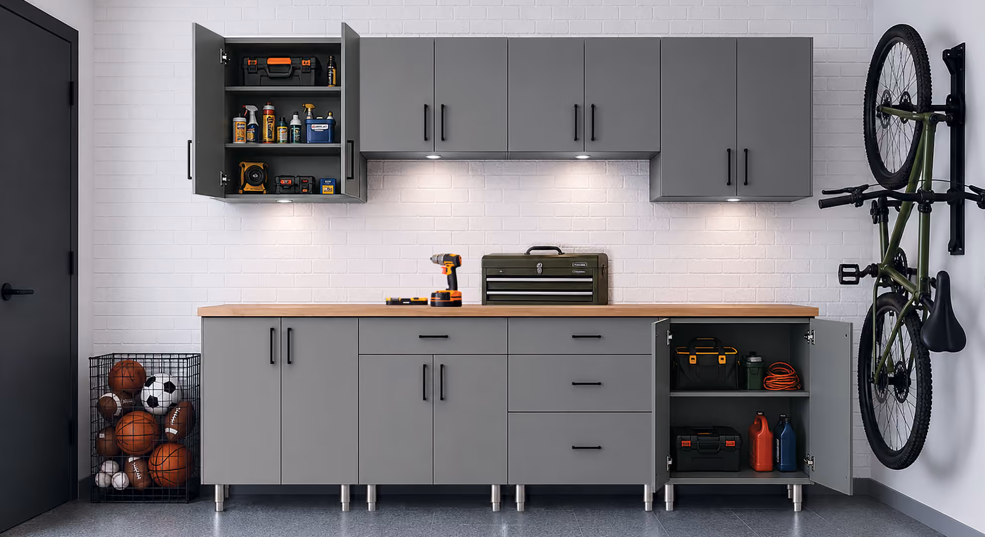Gray Maverick garage cabinets with a bike on the wall