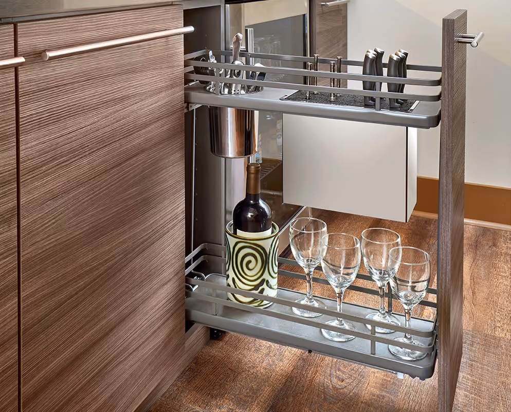 Pull-out wine and glass organizer inside a tall cabinet