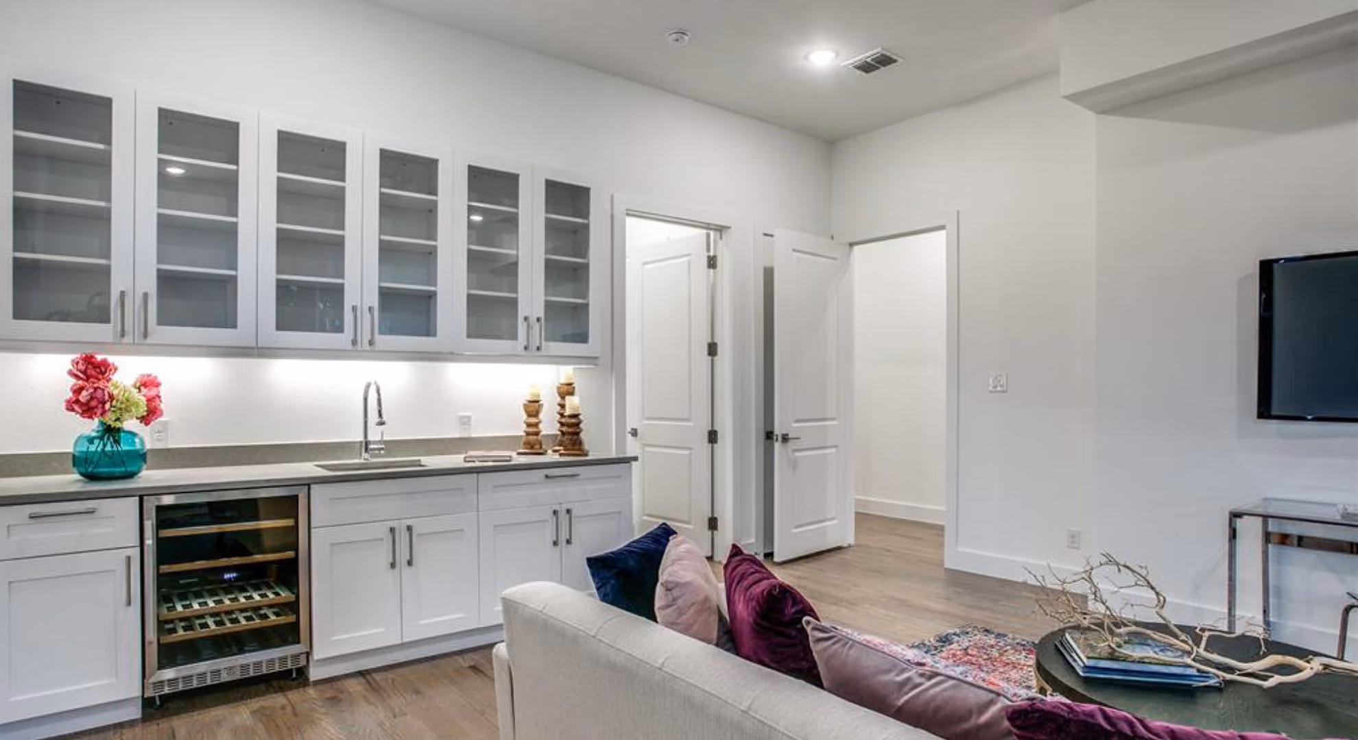 Home bar: white shaker with glass uppers and wine fridge
