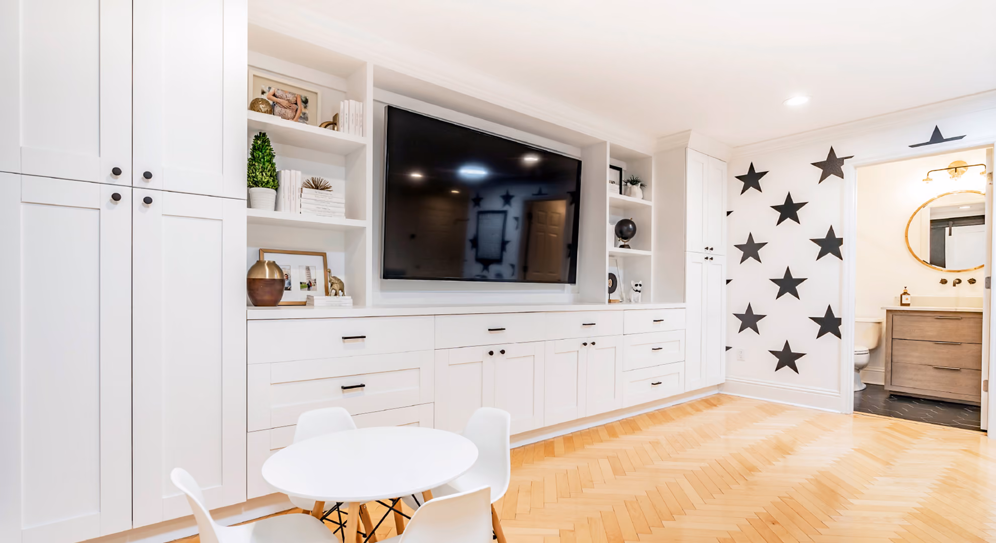 Built-in media wall and playroom: white shaker