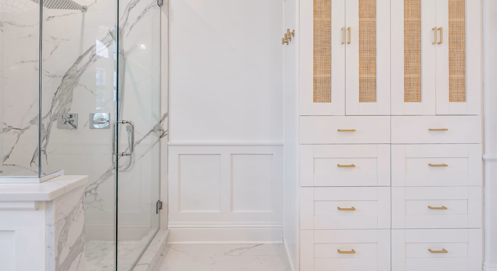 Bath: shower enclosure with white cabinetry