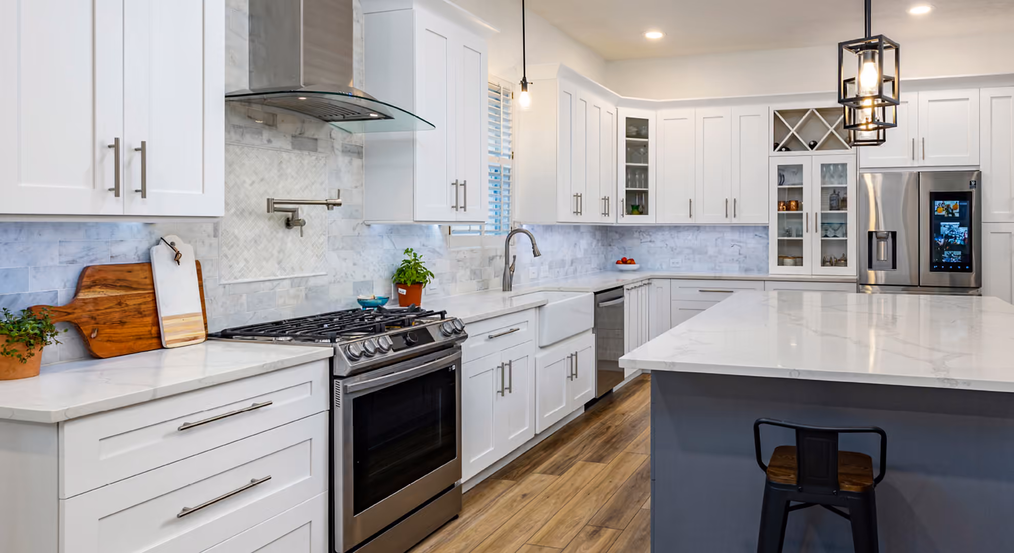White shaker kitchen with a navy island