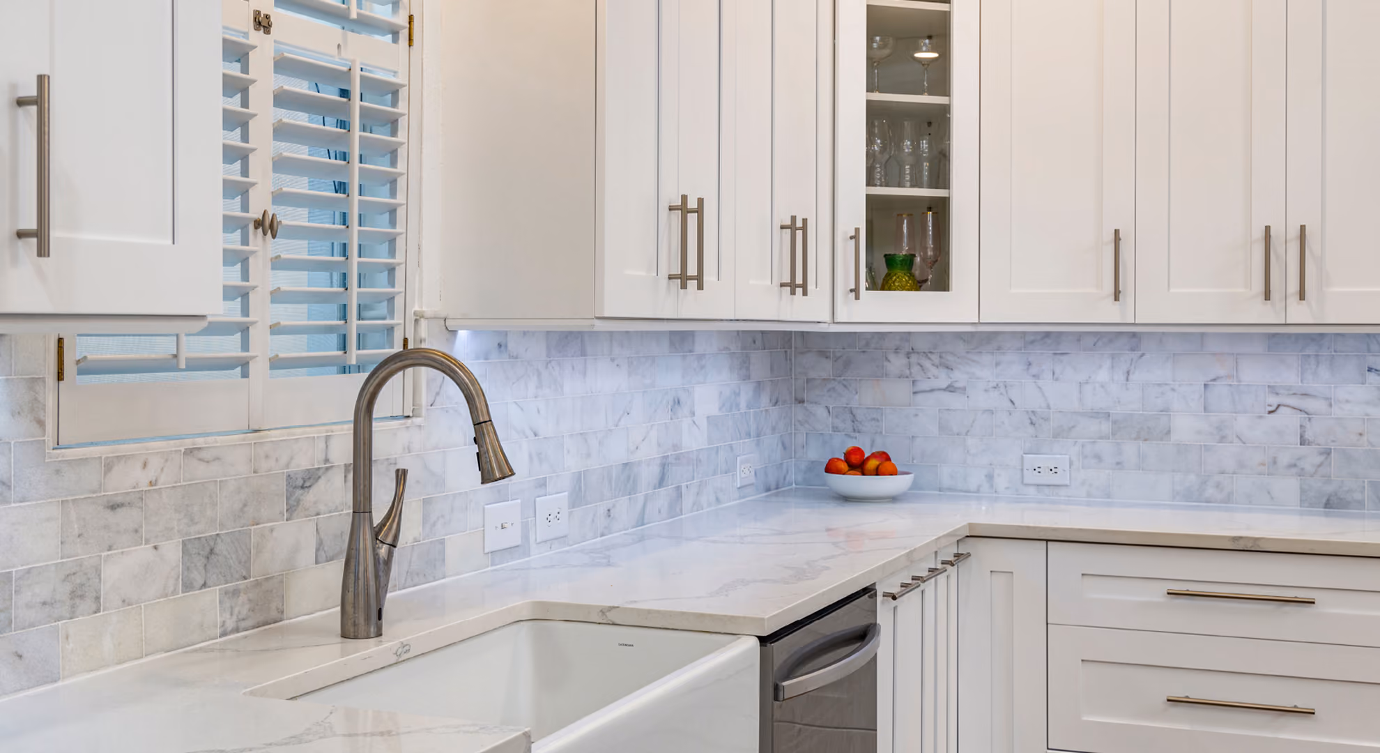 Kitchen: white shaker with farmhouse sink and tile